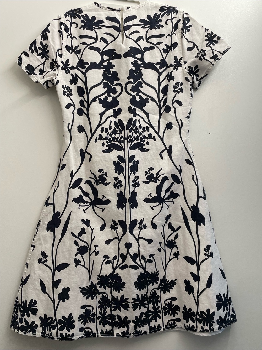 Alexander McQueen white dress with black floral and vine print